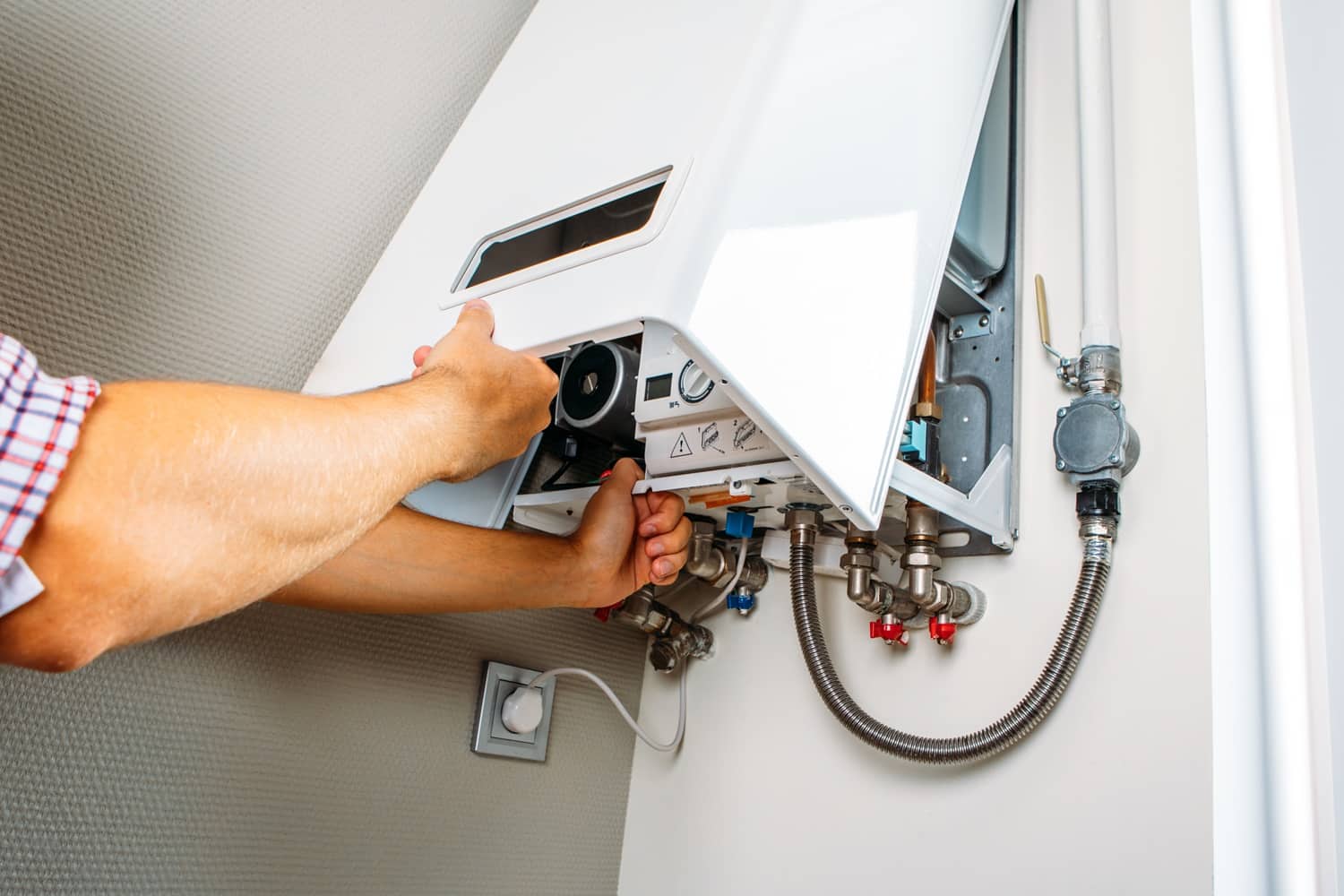 plumber attaches trying to fix the problem with the residential